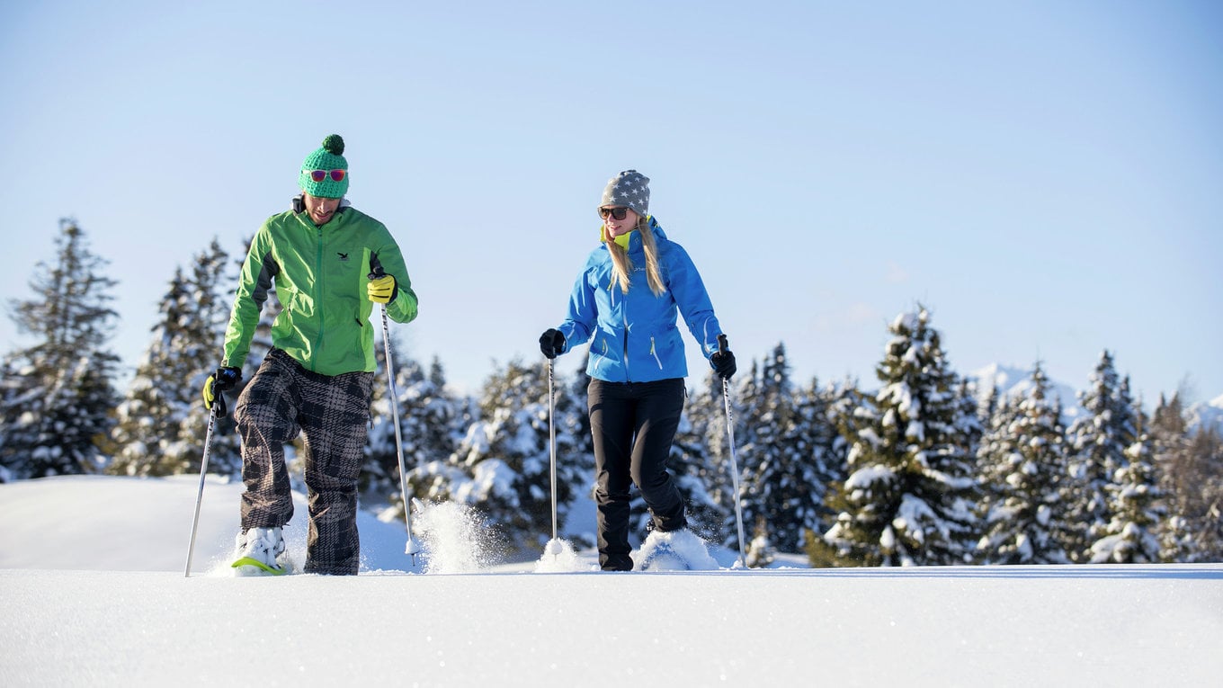 Snowshoe hiking. In the mountains