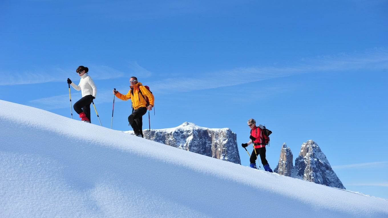 Snowshoe hiking on Alpe di Siusi